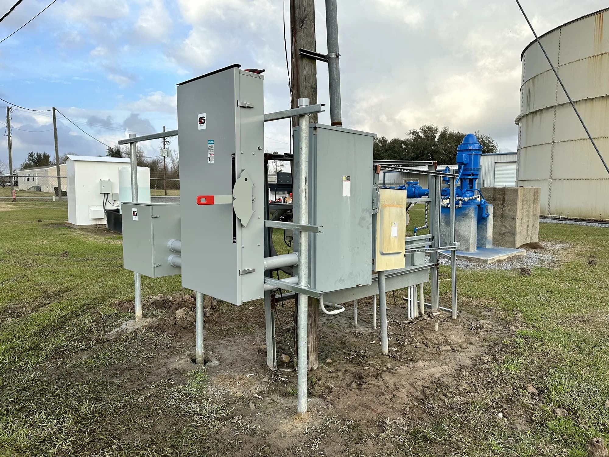 Babcock Electric work in Hackberry, LA — Storm-rebuild service-mast and panel work