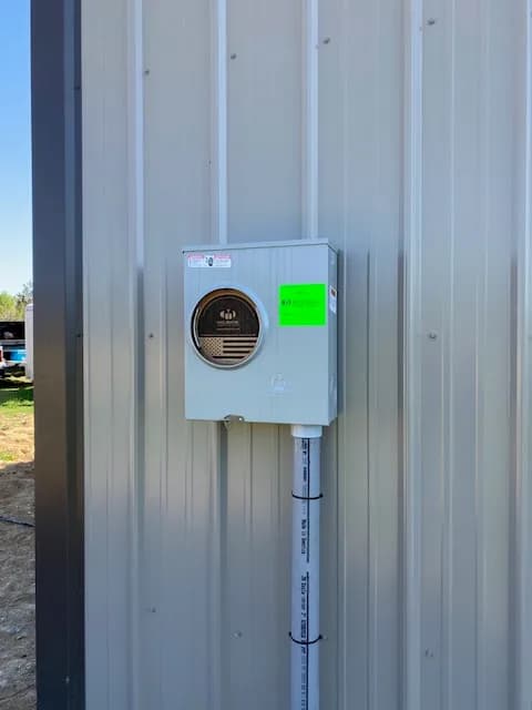 Closer view of the service disconnect with conduit detail